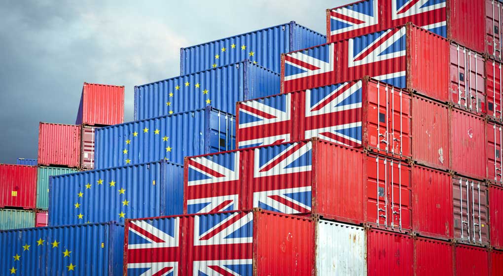Shipping containers with UK and EU flags painted on