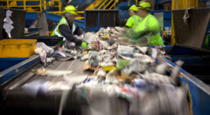 Workers at a recycling plant