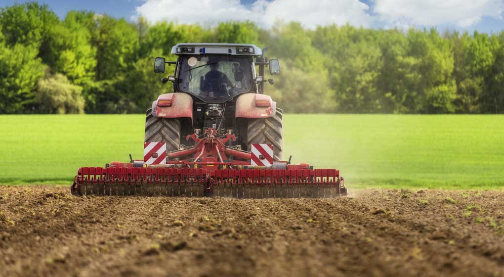 tractor ploughing a field