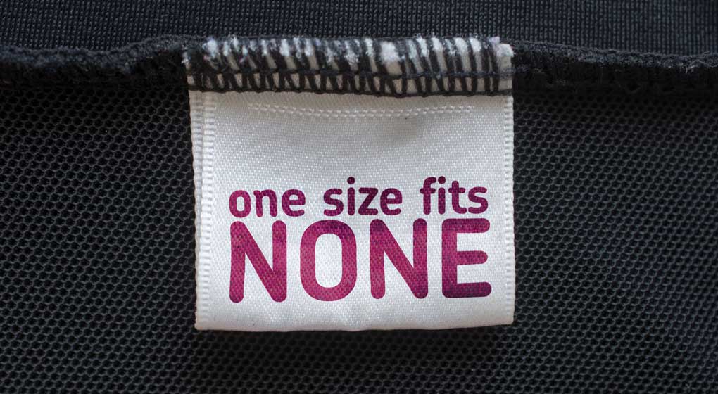 clothing label saying one size fits none