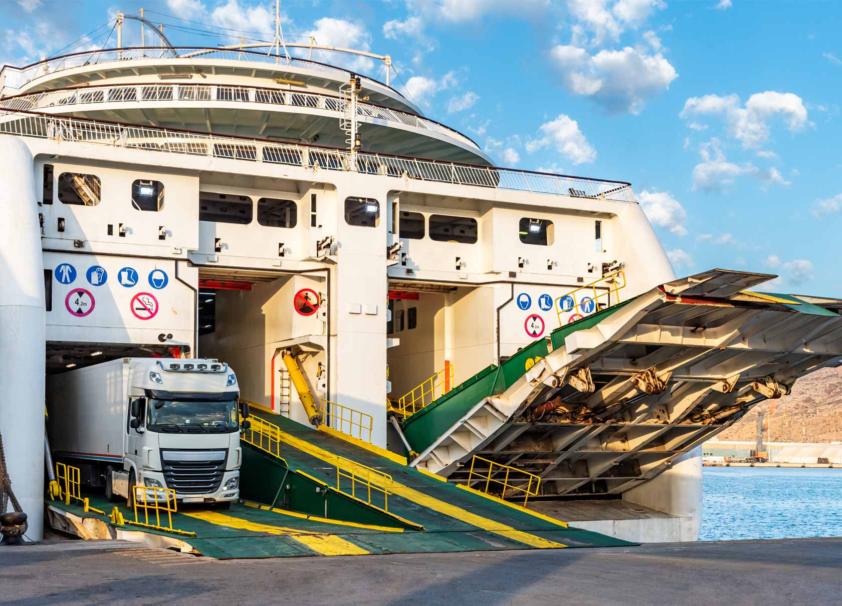 refrigerated lorry driving off a ferry