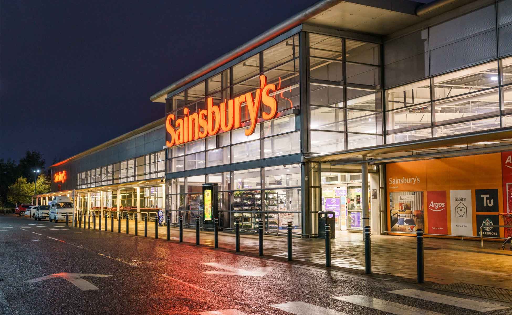 Supermarket entrance at night